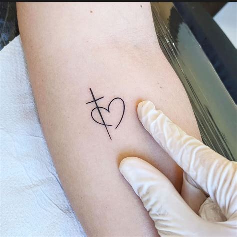 heart and cross tattoo